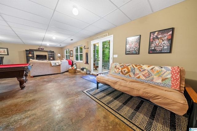 274 County Road 1291, Wedowee, AL 36278 - living area with concrete flooring, a drop ceiling, french doors, and pool table
