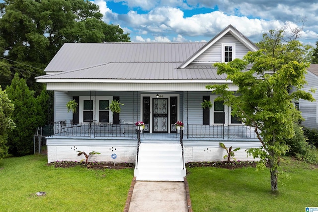 1800 2nd Ave S, Irondale, AL 35210 - bungalow-style home with a porch, a front yard, and metal roof