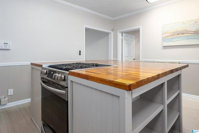 1800 2nd Ave S, Irondale, AL 35210 - kitchen with gas range, wood counters, light wood-style floors, crown molding, and wainscoting