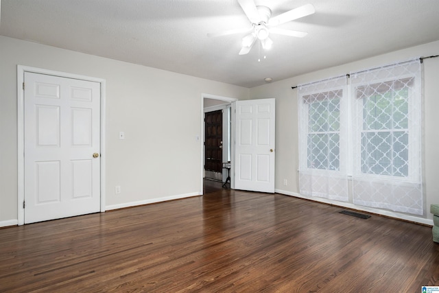 1800 2nd Ave S, Irondale, AL 35210 - unfurnished room featuring a ceiling fan, wood finished floors, and baseboards