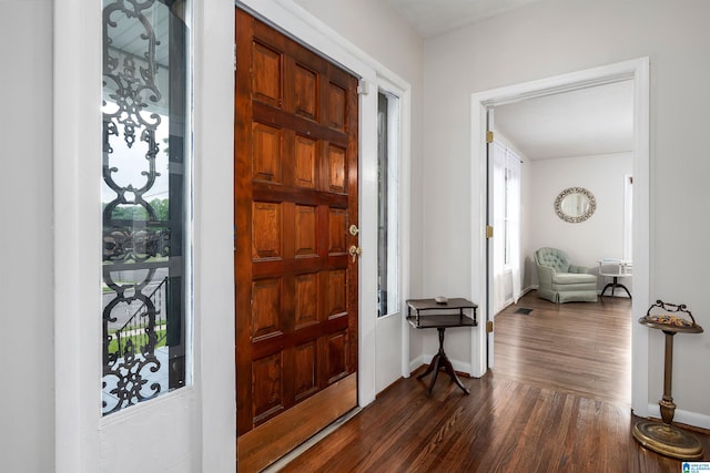 1800 2nd Ave S, Irondale, AL 35210 - foyer entrance featuring dark wood-style floors and baseboards