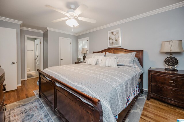 3309 Eaton Rd, Mountain Brook, AL 35223 - bedroom with wood finished floors, crown molding, a ceiling fan, and baseboards