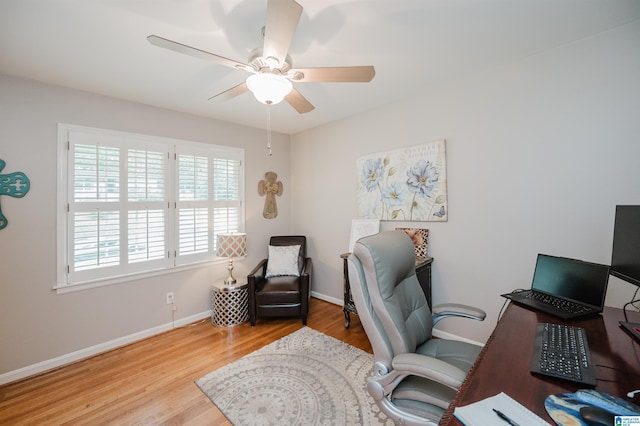 3309 Eaton Rd, Mountain Brook, AL 35223 - home office with a ceiling fan, wood finished floors, and baseboards