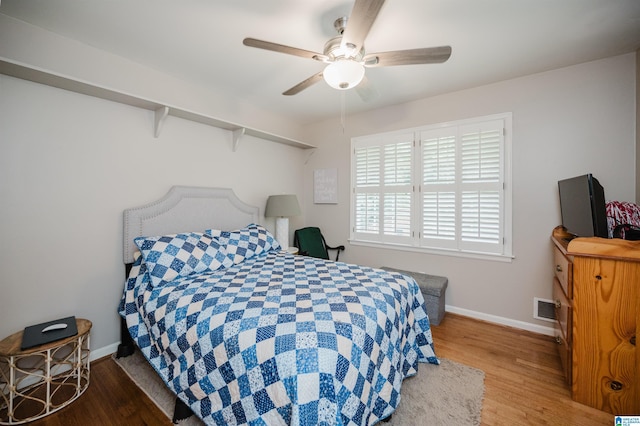 3309 Eaton Rd, Mountain Brook, AL 35223 - bedroom featuring wood finished floors, baseboards, and ceiling fan