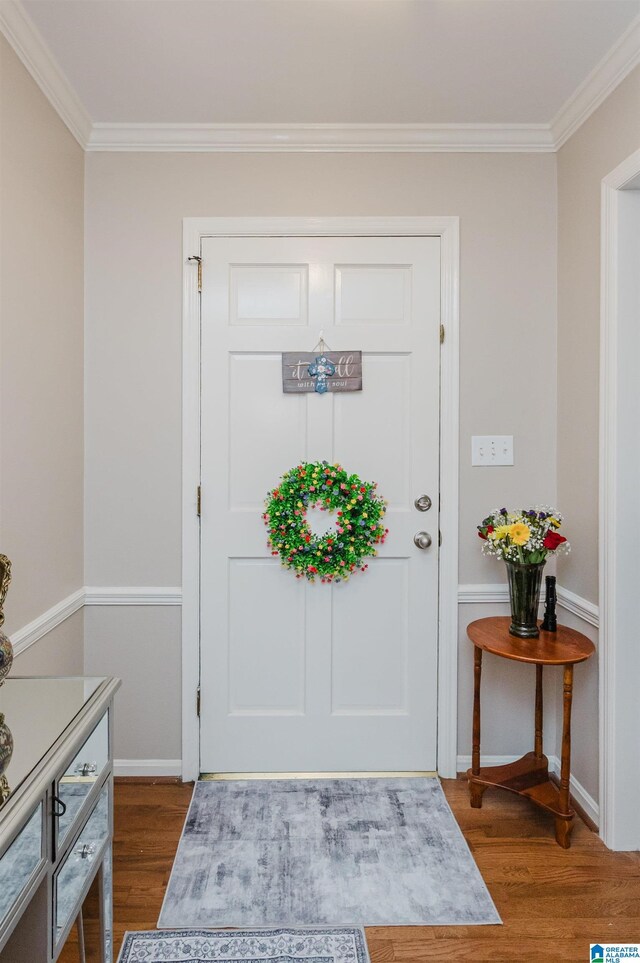 3309 Eaton Rd, Mountain Brook, AL 35223 - entryway with dark wood-style flooring, ornamental molding, and baseboards