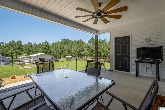 185 Meadowbrook Dr, Piedmont, AL 36272 - view of patio with outdoor dining area and a ceiling fan