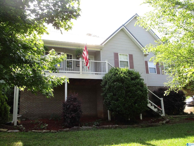 4634 Honeysuckle Rd, Quinton, AL 35130 - rear view of house featuring stairs and a balcony