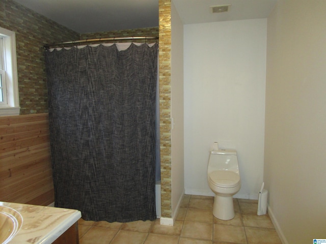 4634 Honeysuckle Rd, Quinton, AL 35130 - full bath featuring tile patterned flooring, toilet, a shower with shower curtain, and vanity