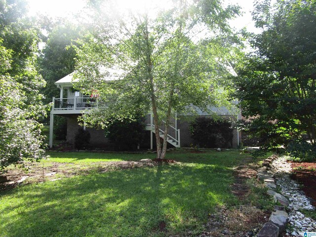 4634 Honeysuckle Rd, Quinton, AL 35130 - view of green lawn featuring stairway