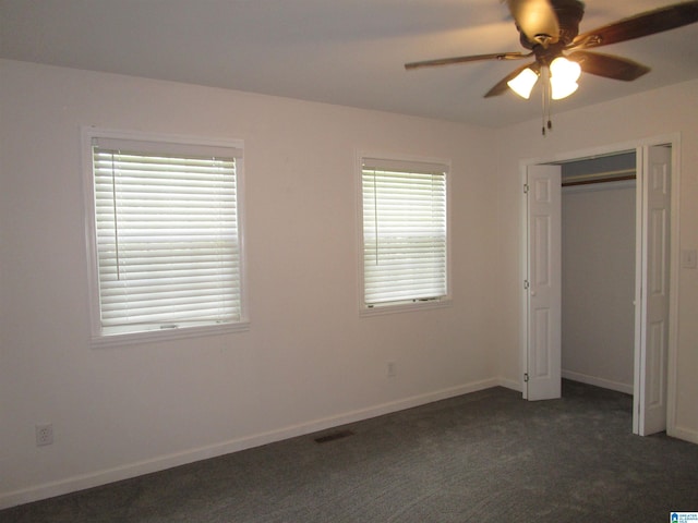 4634 Honeysuckle Rd, Quinton, AL 35130 - unfurnished bedroom featuring baseboards, carpet floors, a ceiling fan, and a closet