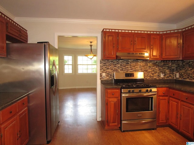 4634 Honeysuckle Rd, Quinton, AL 35130 - kitchen featuring stainless steel appliances, under cabinet range hood, dark countertops, crown molding, and tasteful backsplash