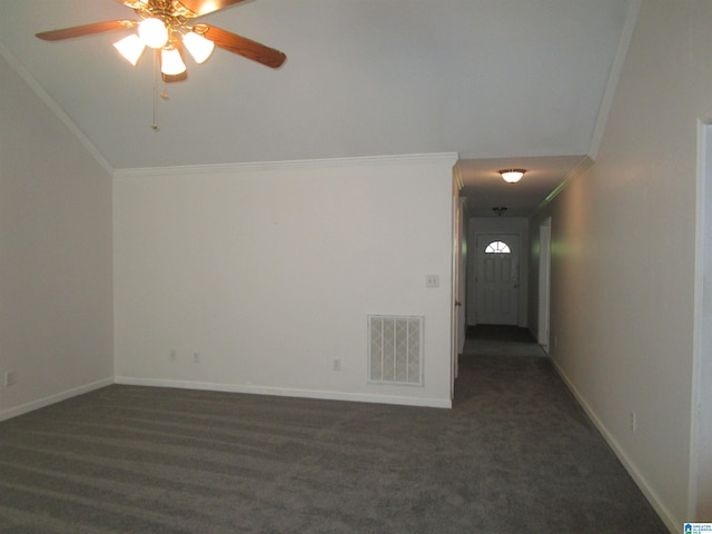 4634 Honeysuckle Rd, Quinton, AL 35130 - spare room with crown molding, ceiling fan, baseboards, lofted ceiling, and dark colored carpet