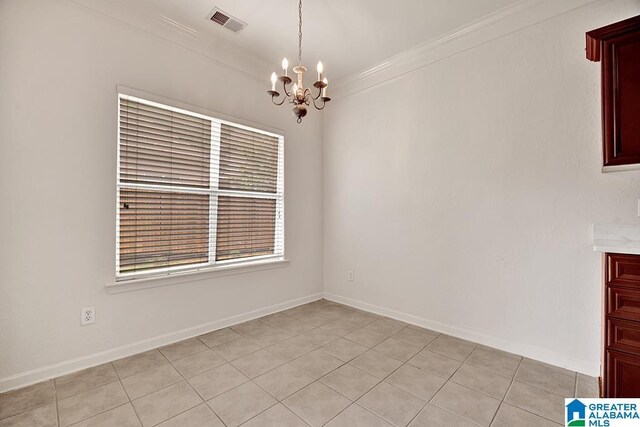 653 Talon Trce, Birmingham, AL 35242 - unfurnished dining area with a chandelier, light tile patterned floors, ornamental molding, and baseboards