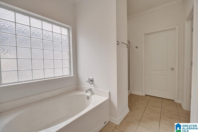 653 Talon Trce, Birmingham, AL 35242 - full bathroom featuring ornamental molding, a bath, tile patterned flooring, baseboards, and a shower