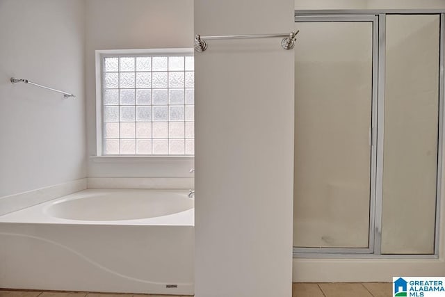 653 Talon Trce, Birmingham, AL 35242 - full bath with a shower stall, tile patterned floors, and a garden tub