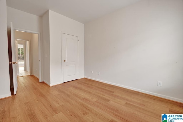 653 Talon Trce, Birmingham, AL 35242 - unfurnished bedroom featuring light wood-style floors and baseboards