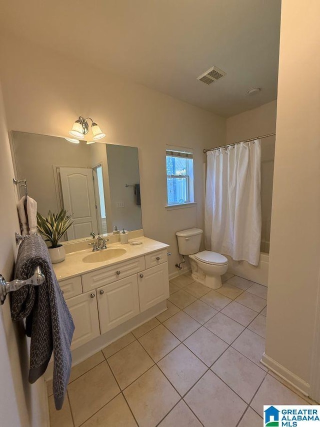 653 Talon Trce, Birmingham, AL 35242 - bathroom with toilet, vanity, tile patterned floors, and shower / tub combo with curtain