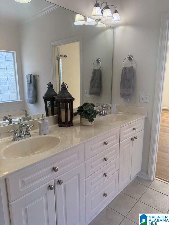 653 Talon Trce, Birmingham, AL 35242 - full bathroom with double vanity, ornamental molding, tile patterned floors, and a chandelier