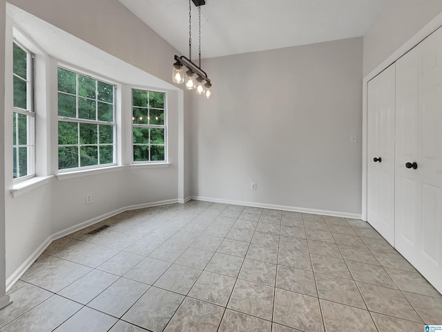 806 14th Ave, Pleasant Grove, AL 35127 - unfurnished dining area with light tile patterned floors and baseboards