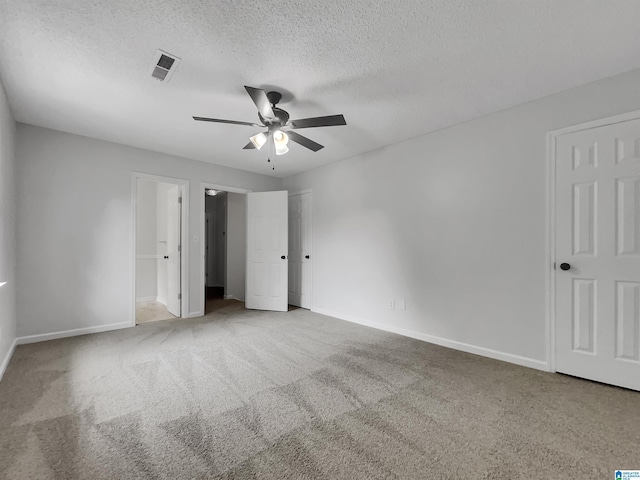 806 14th Ave, Pleasant Grove, AL 35127 - unfurnished bedroom featuring carpet floors, baseboards, a textured ceiling, and a ceiling fan