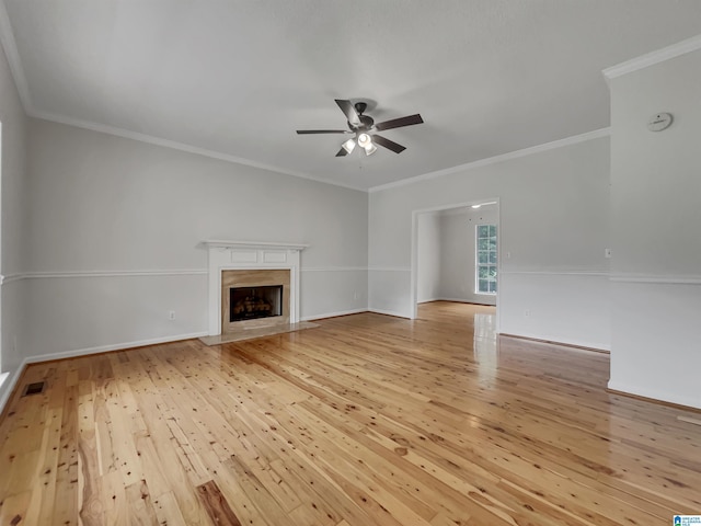 806 14th Ave, Pleasant Grove, AL 35127 - unfurnished living room featuring ceiling fan, light wood-style flooring, a high end fireplace, ornamental molding, and baseboards