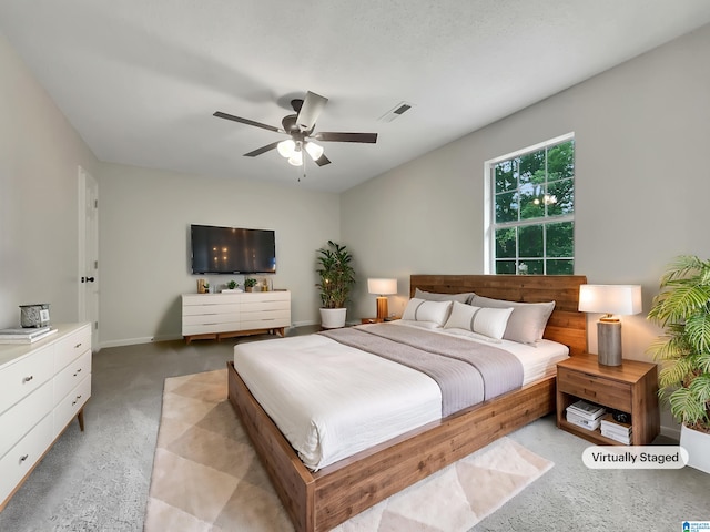 806 14th Ave, Pleasant Grove, AL 35127 - bedroom featuring light carpet, a ceiling fan, and baseboards