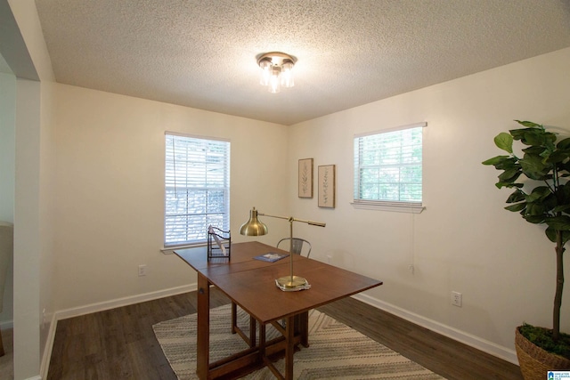 1725 Faircrest Dr, Hueytown, AL 35023 - home office with plenty of natural light, wood finished floors, baseboards, and a textured ceiling