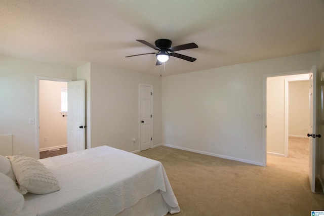 1725 Faircrest Dr, Hueytown, AL 35023 - bedroom with baseboards, light colored carpet, and a ceiling fan
