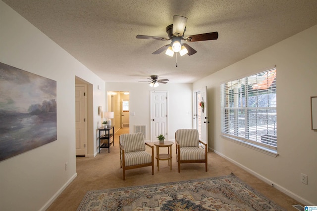 1725 Faircrest Dr, Hueytown, AL 35023 - sitting room with a ceiling fan, carpet flooring, baseboards, and a textured ceiling