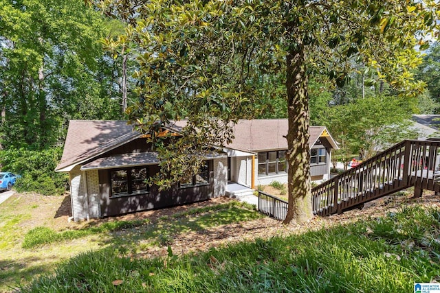 1608 Kestwick Dr, Hoover, AL 35226 - back of house with brick siding and roof with shingles