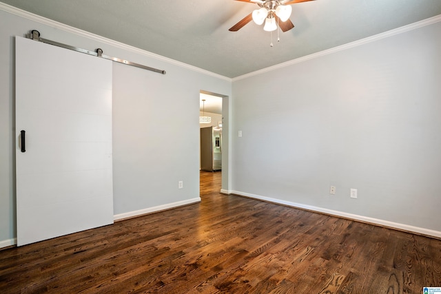 295 Walden Ct, Montevallo, AL 35115 - unfurnished bedroom featuring crown molding, dark wood finished floors, baseboards, ceiling fan, and a barn door