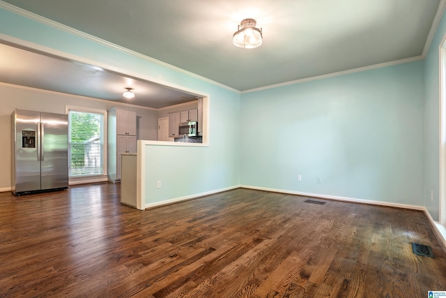 295 Walden Ct, Montevallo, AL 35115 - unfurnished living room featuring dark wood-style flooring, ornamental molding, and baseboards
