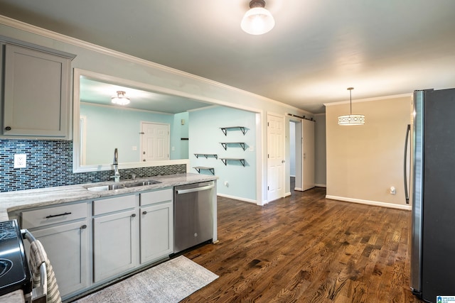 295 Walden Ct, Montevallo, AL 35115 - kitchen featuring stainless steel appliances, a sink, tasteful backsplash, dark wood-style floors, and ornamental molding