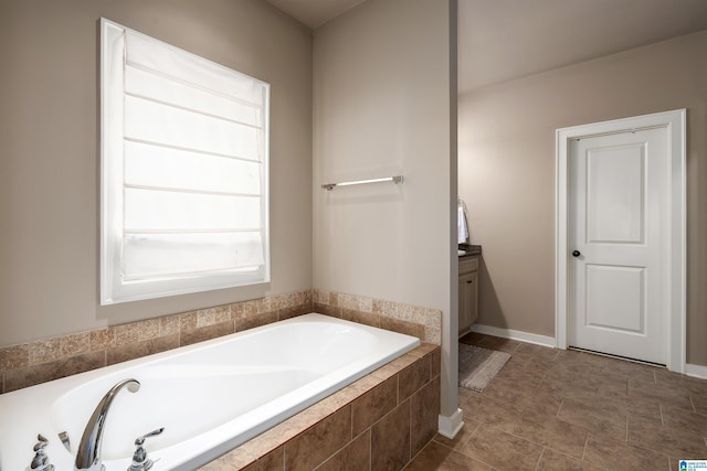 3701 James Hill Ter, Hoover, AL 35226 - bathroom with a garden tub and vanity