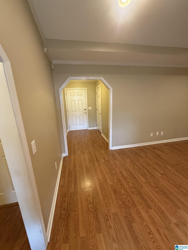 18470 Whispering Meadows Blvd, Vance, AL 35490 - hall featuring wood finished floors, baseboards, crown molding, and arched walkways