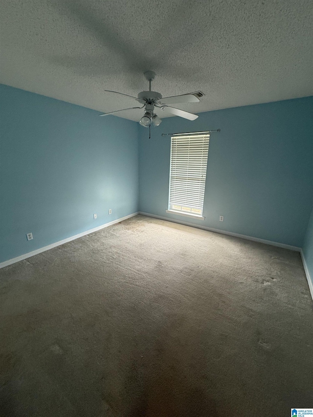 18470 Whispering Meadows Blvd, Vance, AL 35490 - carpeted empty room with baseboards, a ceiling fan, and a textured ceiling