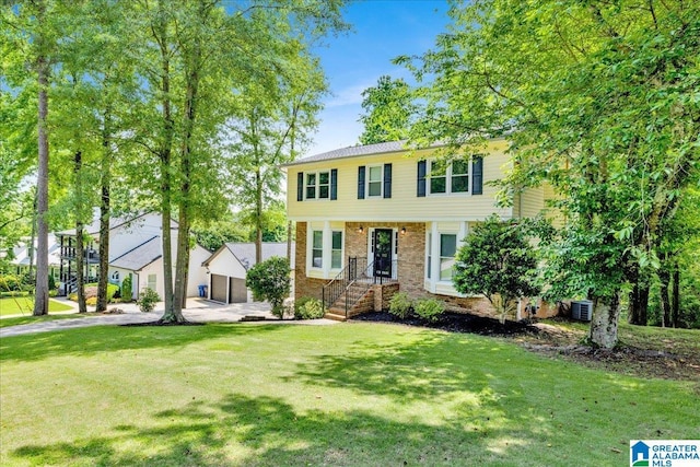 113 Pine Cliff Cir, Hoover, AL 35226 - view of front facade with a front yard, brick siding, and central air condition unit