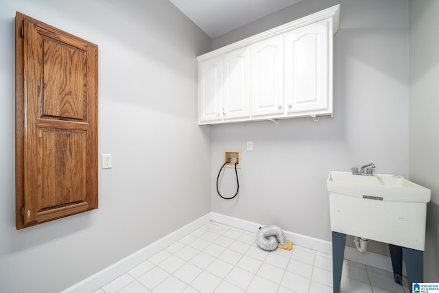 295 Ridge View Way, Springville, AL 35146 - laundry room with washer hookup, baseboards, and cabinet space