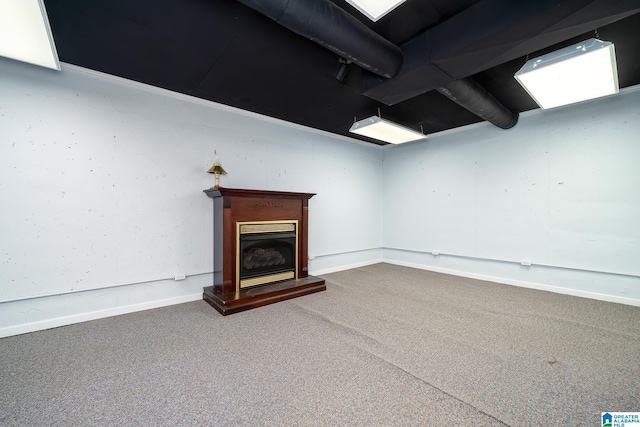 295 Ridge View Way, Springville, AL 35146 - finished basement with carpet, a glass covered fireplace, and baseboards