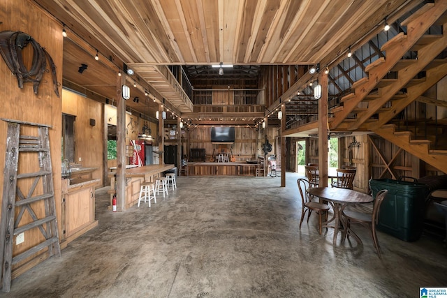 295 Ridge View Way, Springville, AL 35146 - miscellaneous room with concrete floors and wood walls