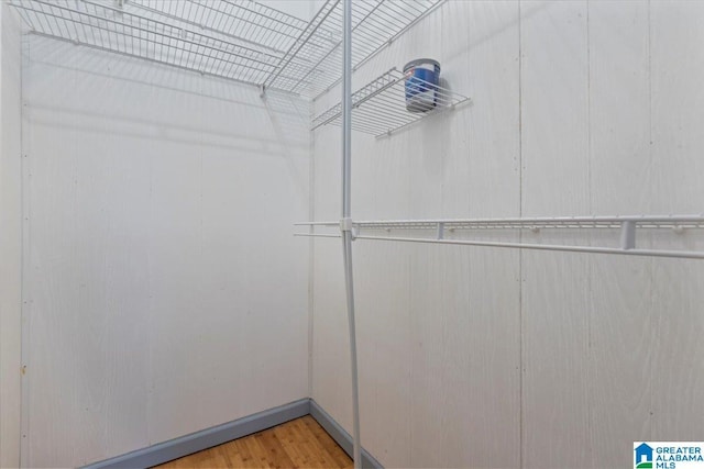 114NW Morgan Ave, Cullman, AL 35055 - walk in closet featuring wood finished floors