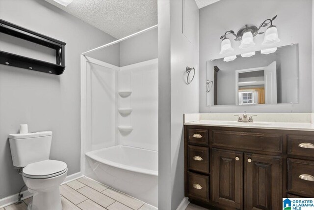 114NW Morgan Ave, Cullman, AL 35055 - full bath featuring toilet, a textured ceiling, baseboards, vanity, and shower / bathtub combination