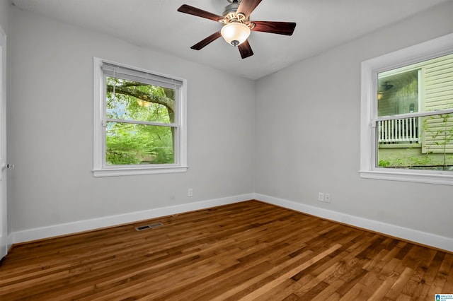 4763 7th Ct S, Birmingham, AL 35222 - empty room featuring baseboards, wood finished floors, and ceiling fan