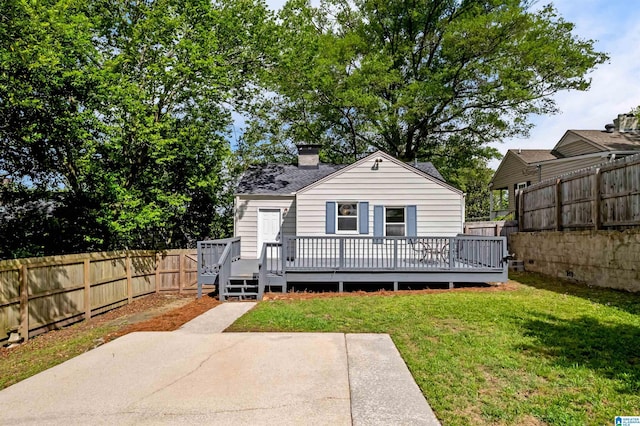 4763 7th Ct S, Birmingham, AL 35222 - back of house with a patio area, a wooden deck, and a chimney