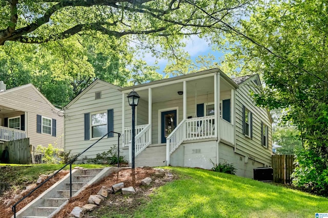4763 7th Ct S, Birmingham, AL 35222 - view of front of house featuring covered porch and a front yard