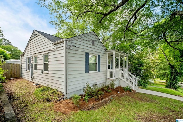4763 7th Ct S, Birmingham, AL 35222 - view of side of home featuring roof with shingles