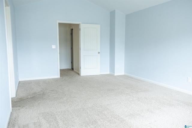 222 Sarah Way, Kimberly, AL 35091 - carpeted empty room featuring vaulted ceiling and baseboards