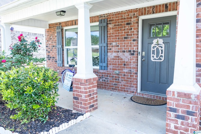 222 Sarah Way, Kimberly, AL 35091 - property entrance featuring a porch and brick siding