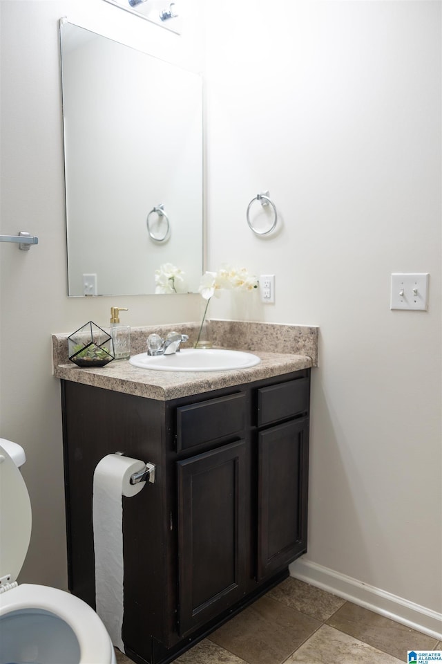 222 Sarah Way, Kimberly, AL 35091 - bathroom featuring vanity, toilet, and baseboards