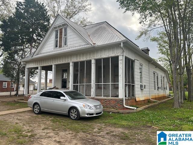 1711 5th Ave N, Bessemer, AL 35020 - view of front of home with a sunroom